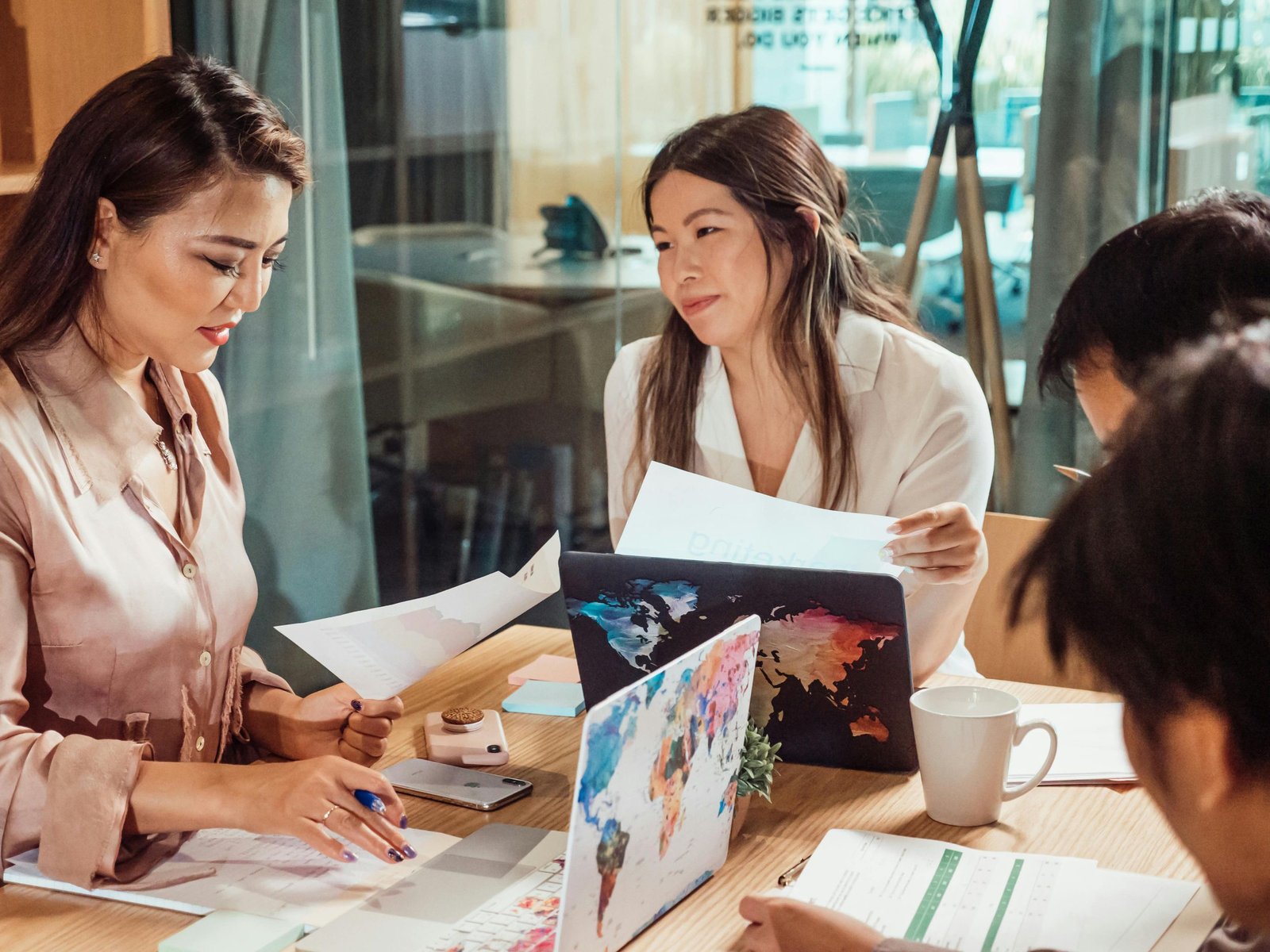 Two women discussing work